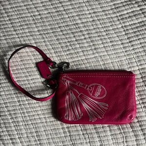 Coach Fuchsia Leather Wristlet with Tassel Design